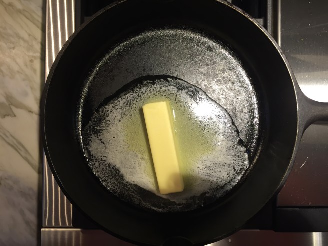 Melt butter in an ovenproof skillet