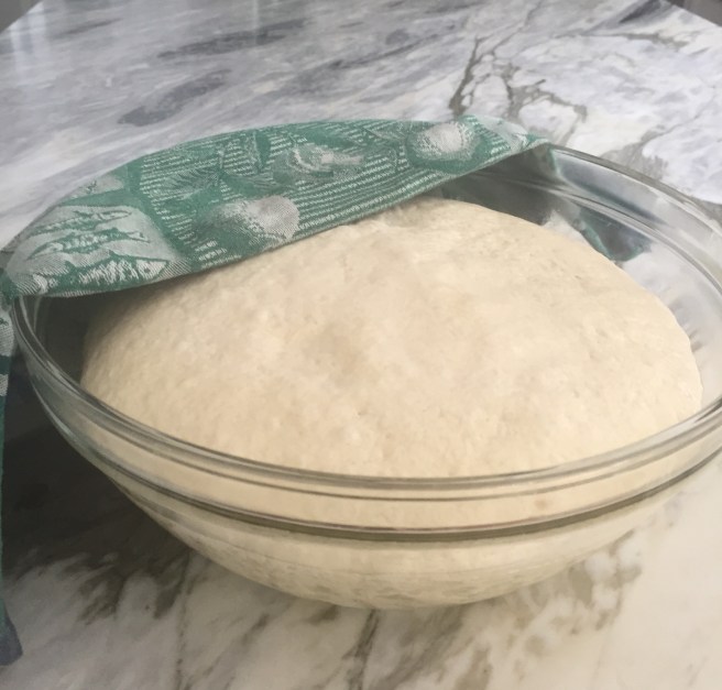 The dough has doubled in bulk and is done rising.