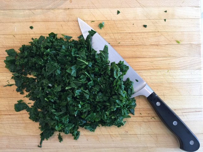 Chopped kale on cutting board.