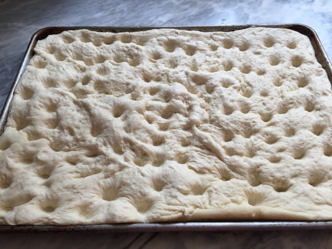 Dimpled focaccia dough
