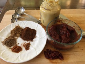 Chili powder, cumin, coriander, cayenne, cinnamon, chipotle, and dijon mustard