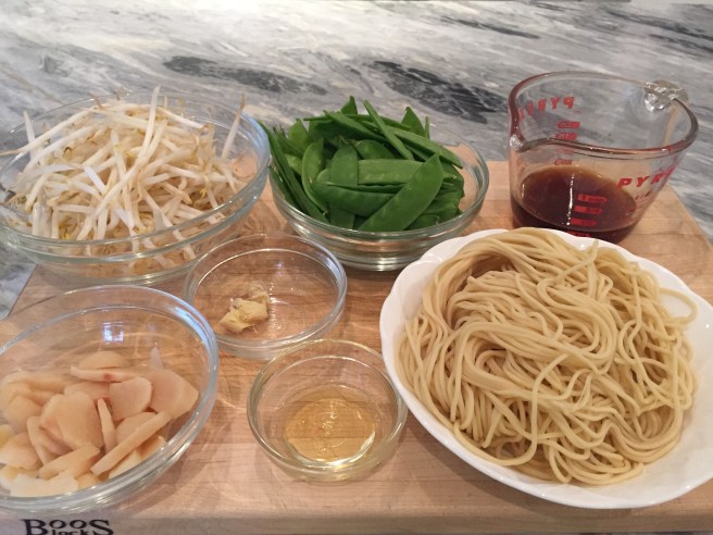 Longevity noodle ingredients: noodles, bean sprouts, snow peas, water chestnuts, ginger, peanut oil, soy sauce, chicken stock, and sesame oil.