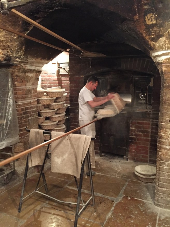 Turning the dough out onto the peel at Poilâne
